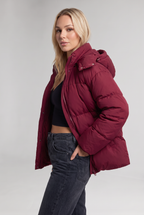 Women's Oversized Padded Puffer Jacket with Detachable Hood and Pockets in Burgundy – Full Length View