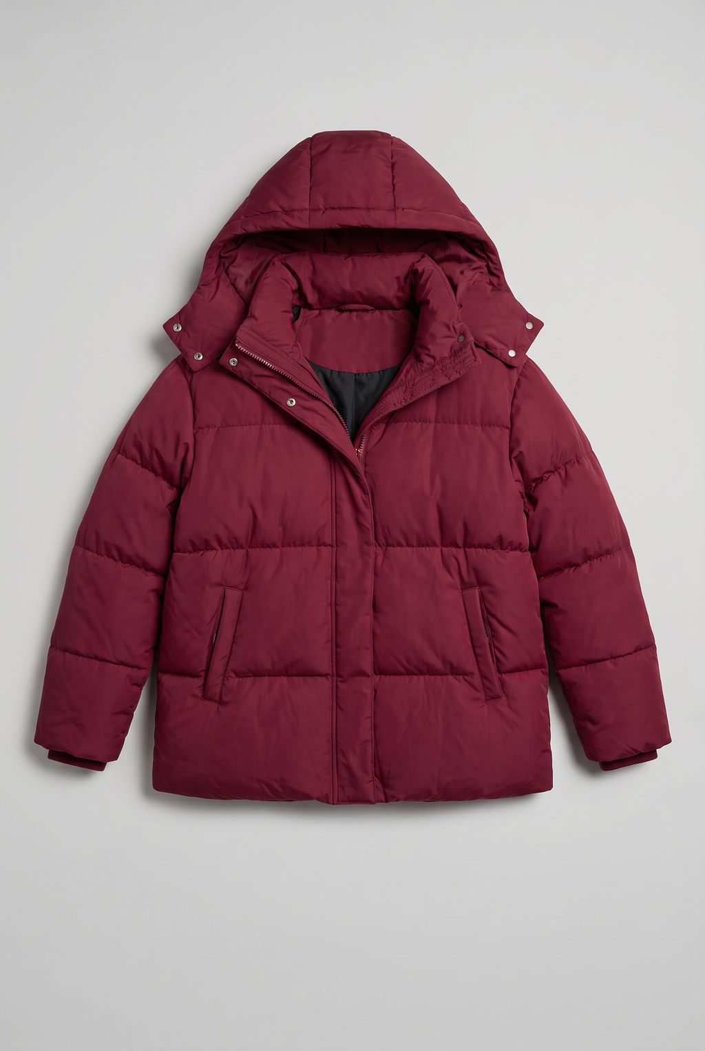 Women's Oversized Padded Puffer Jacket with Detachable Hood and Pockets in Burgundy – Flat Lay