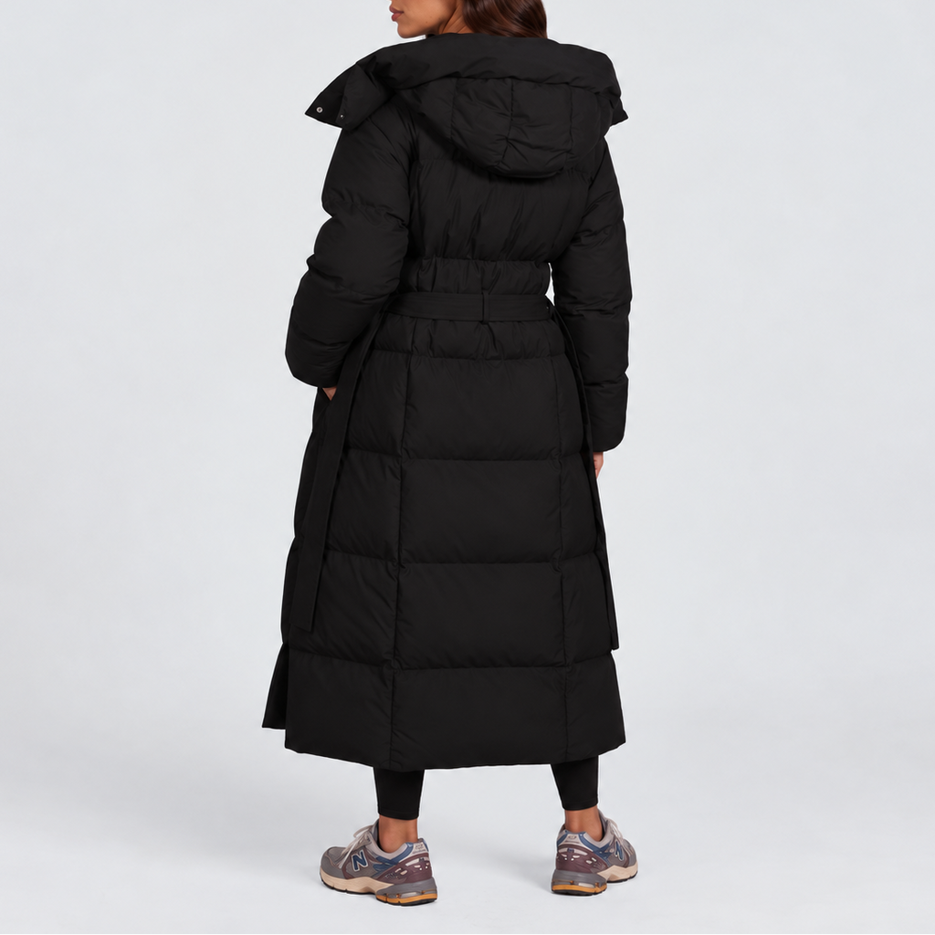 Women's long hooded puffer coat with a tie belt at the waist