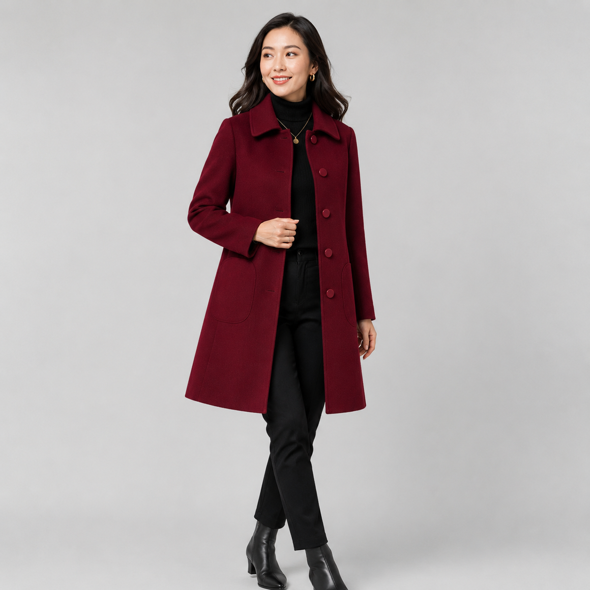 Women's wool blend longline coat with a button front and side pockets