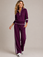 Women's knitted two piece set with a quarter zip jumper and wide leg trousers