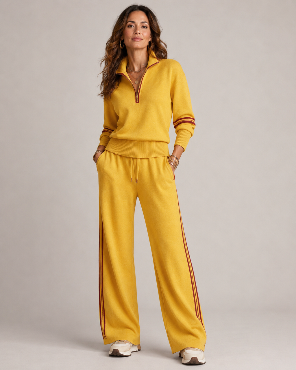 Women's knitted two piece set with a quarter zip jumper and wide leg trousers