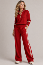 Women's knitted two piece set with a quarter zip jumper and wide leg trousers