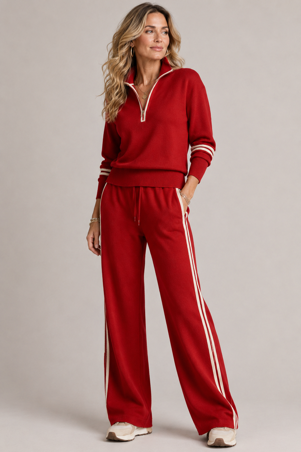 Women's knitted two piece set with a quarter zip jumper and wide leg trousers
