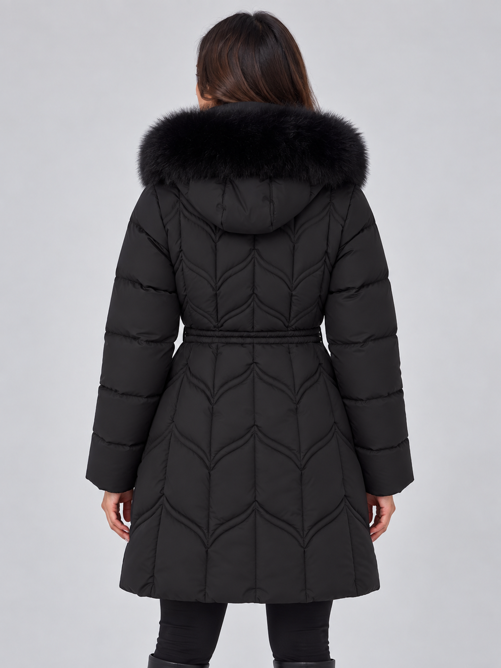 Women's faux fur hooded puffer coat with a drawstring waist