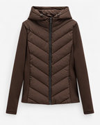 Women's hooded quilted puffer jacket with zip front and chevron padding
