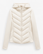 Women's hooded quilted puffer jacket with zip front and chevron padding