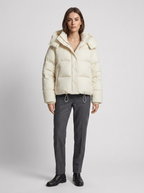 Women's oversized puffer jacket with a hood and a drawcord hem