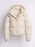 Women's oversized puffer jacket with a hood and a drawcord hem