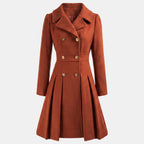 Women's double breasted wool blend coat with a fitted waist and a flared hem