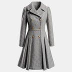 Women's double breasted wool blend coat with a fitted waist and a flared hem