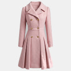 Women's double breasted wool blend coat with a fitted waist and a flared hem