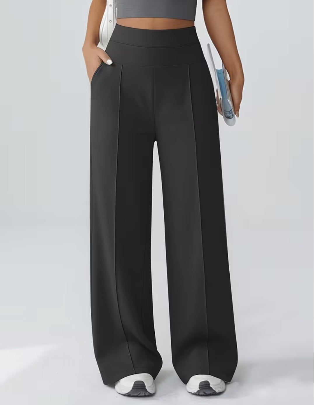 Women's wide leg trousers with a wide elasticated high waistband and side pockets