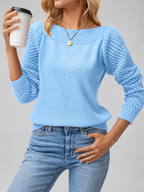 blue knitted jumper studio view