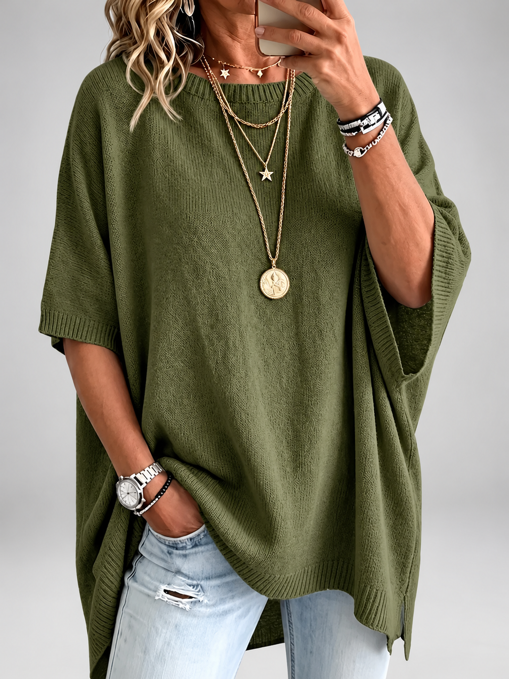 Women's oversized knitted jumper in Army Green – studio view 1