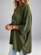 Women's oversized knitted jumper in Army Green – studio view 2