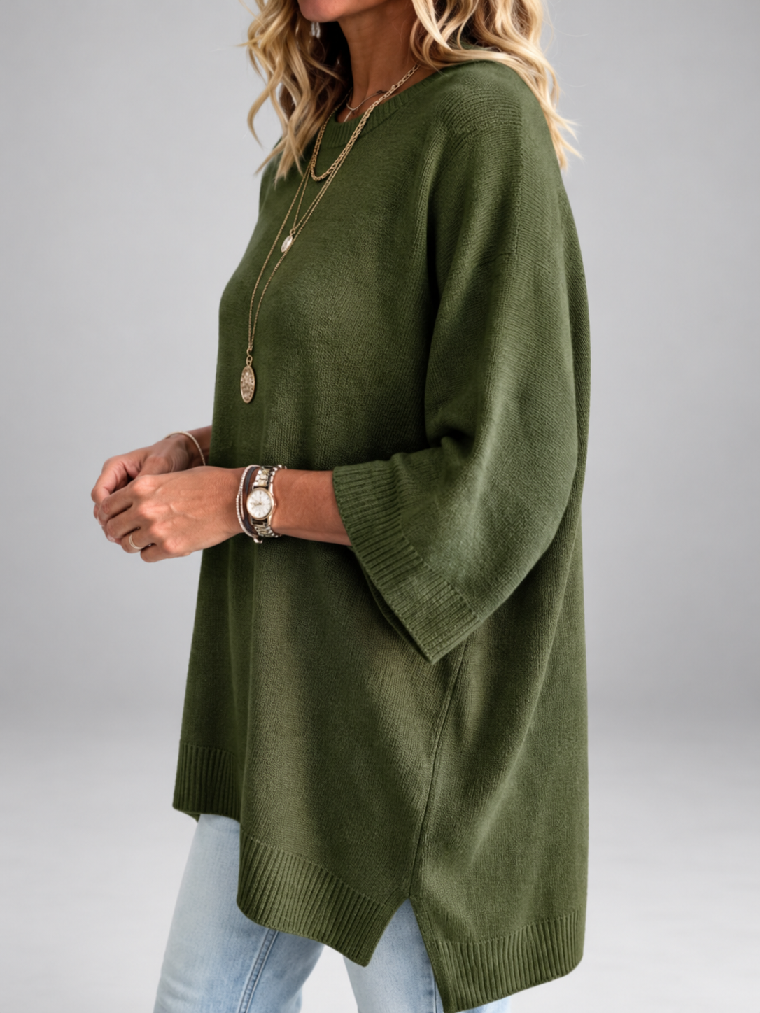 Women's oversized knitted jumper in Army Green – studio view 2