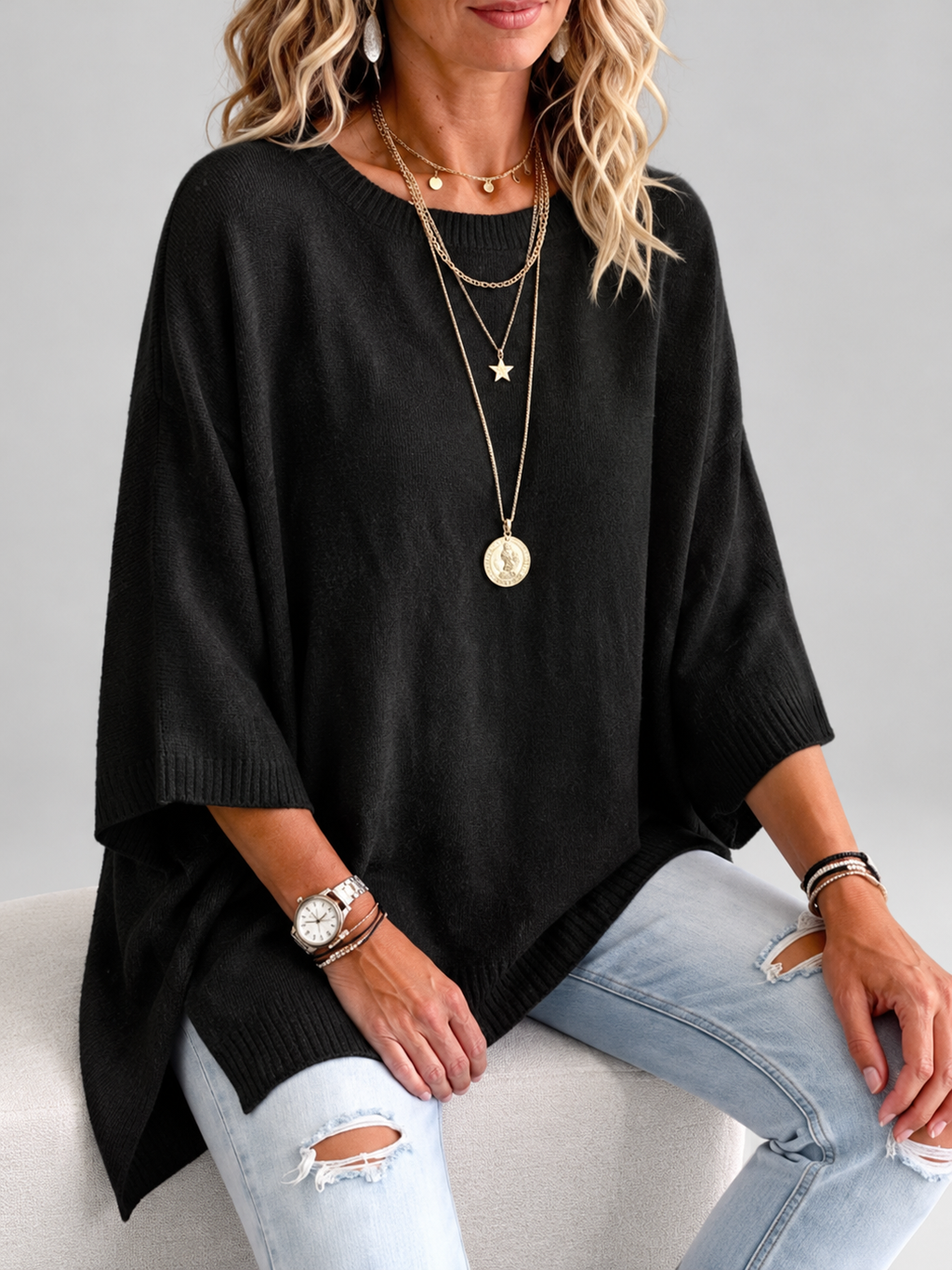 Women's oversized knitted jumper in black – studio view 3