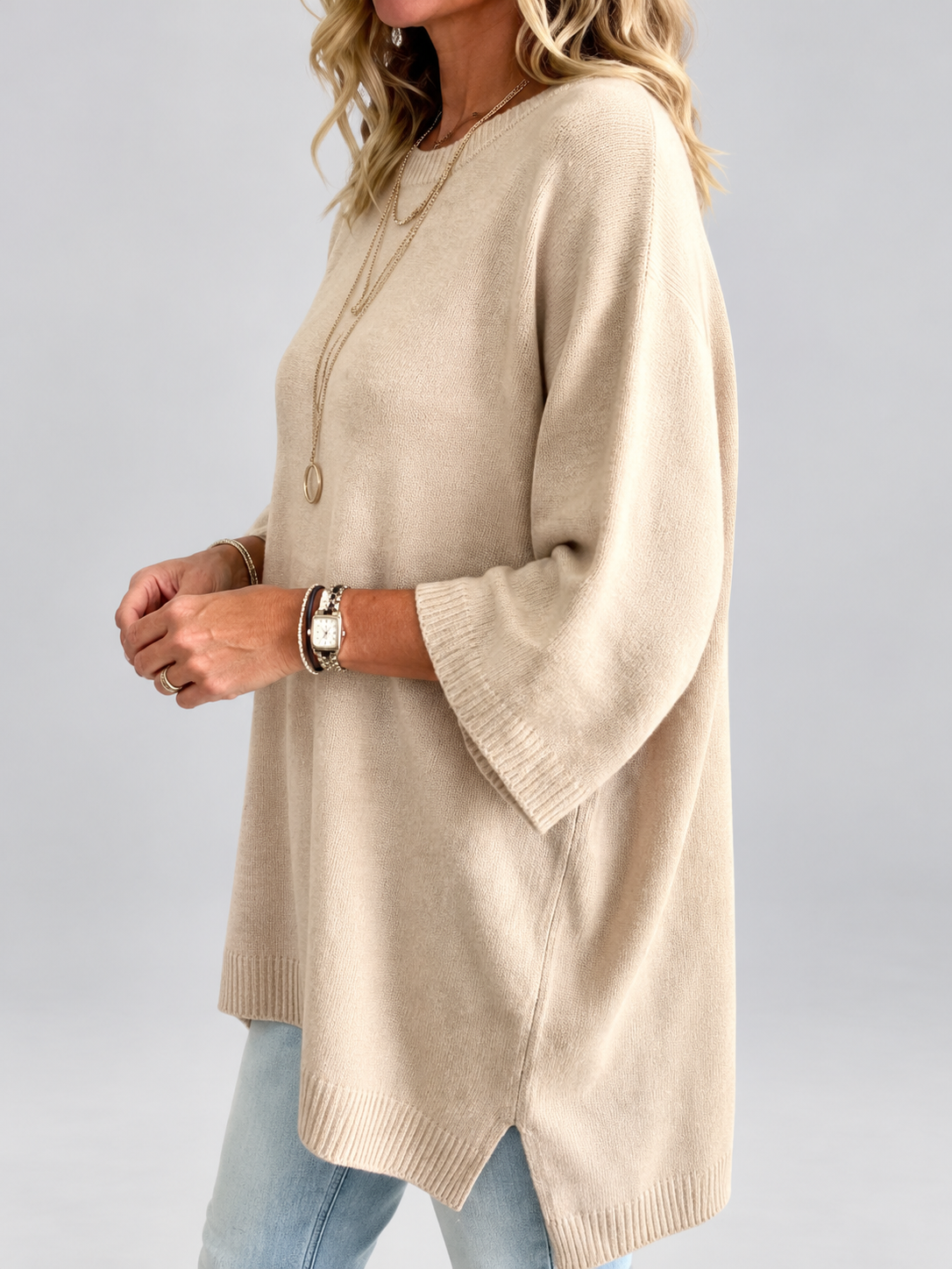 Women's oversized knitted jumper in khaki – studio view 2