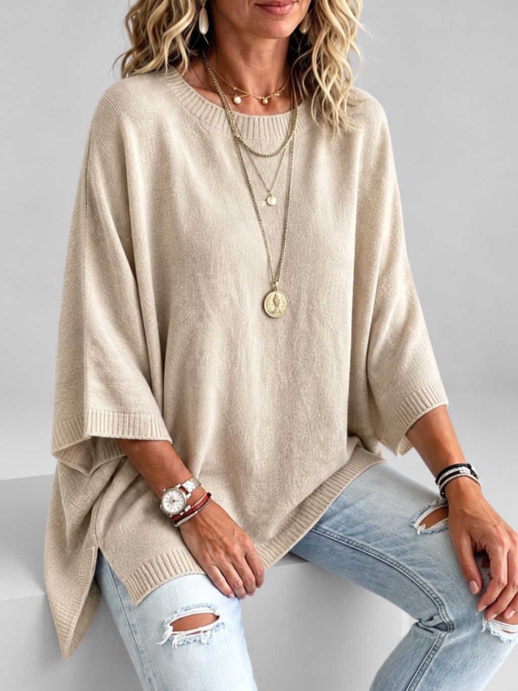 Women's oversized knitted jumper in khaki – studio view 3