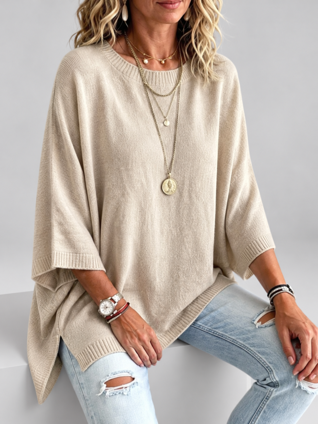 Women's oversized knitted jumper in khaki – studio view 3