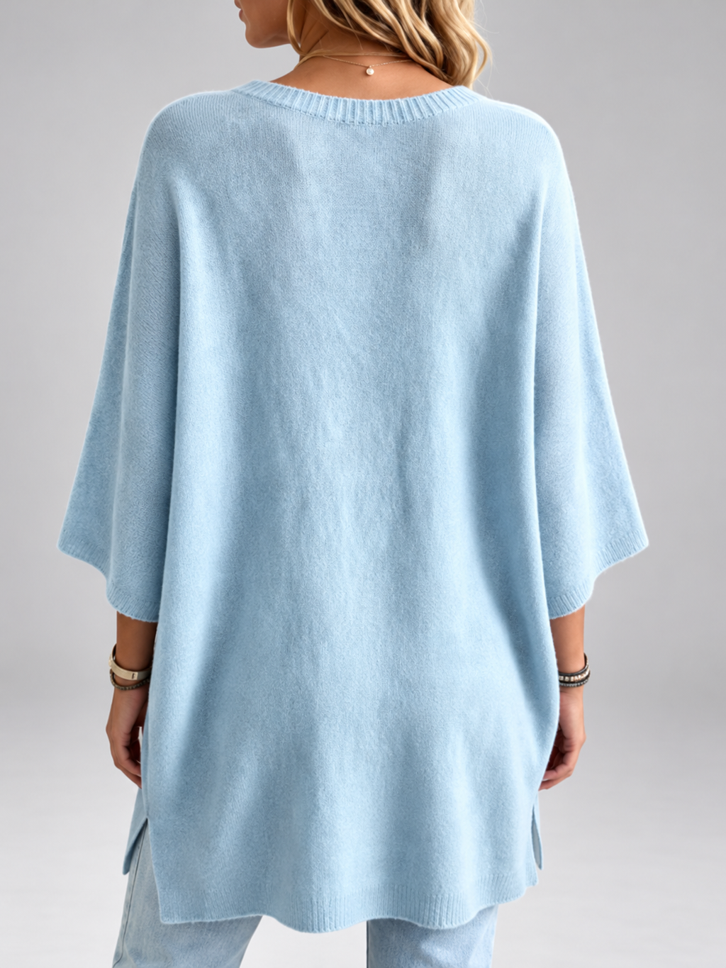 Women's oversized knitted jumper in Light Blue – studio view 3