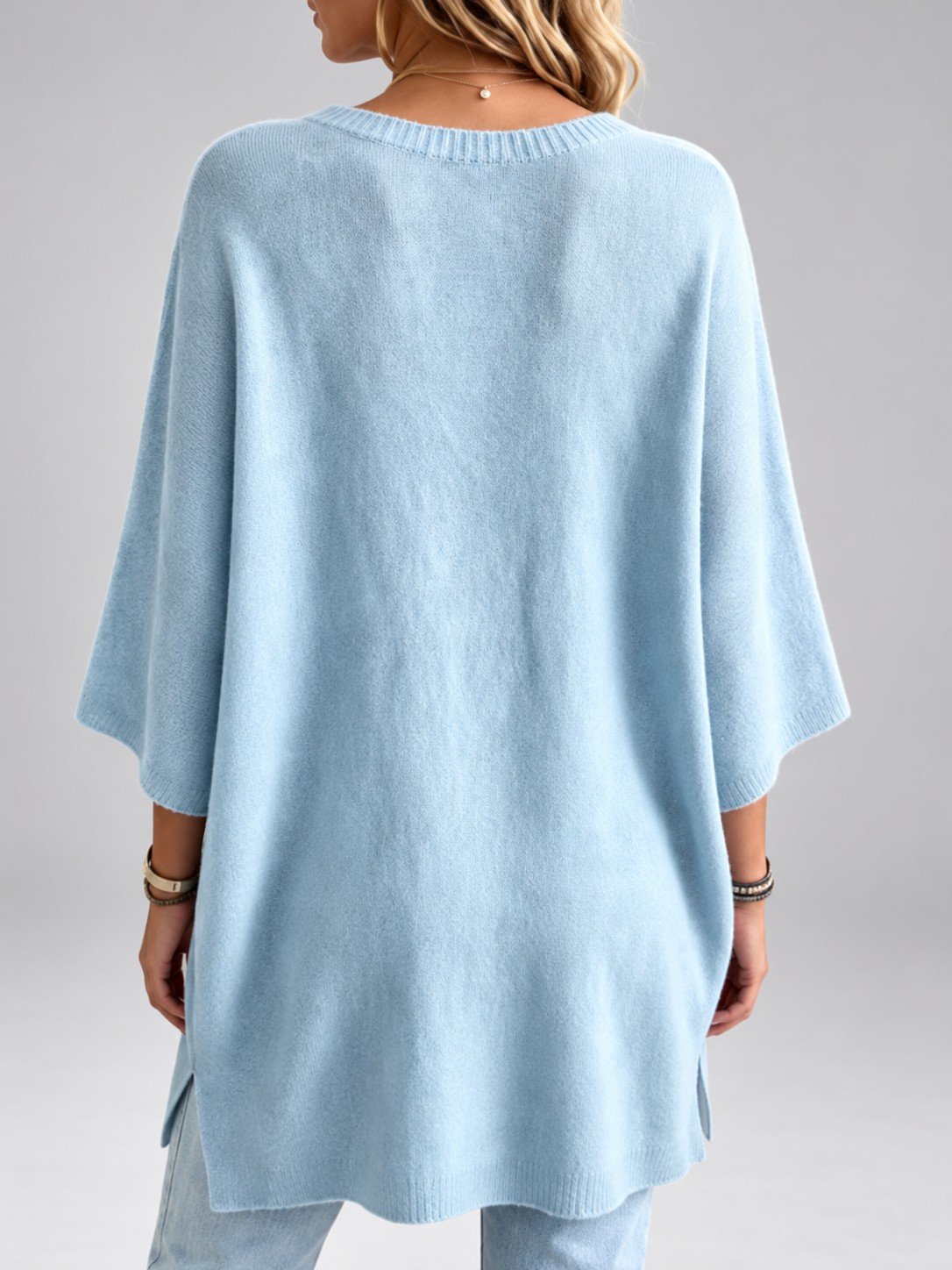 Women's oversized knitted jumper in Light Blue – studio view 3