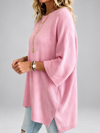 Women's oversized knitted jumper in Pink – studio view 1