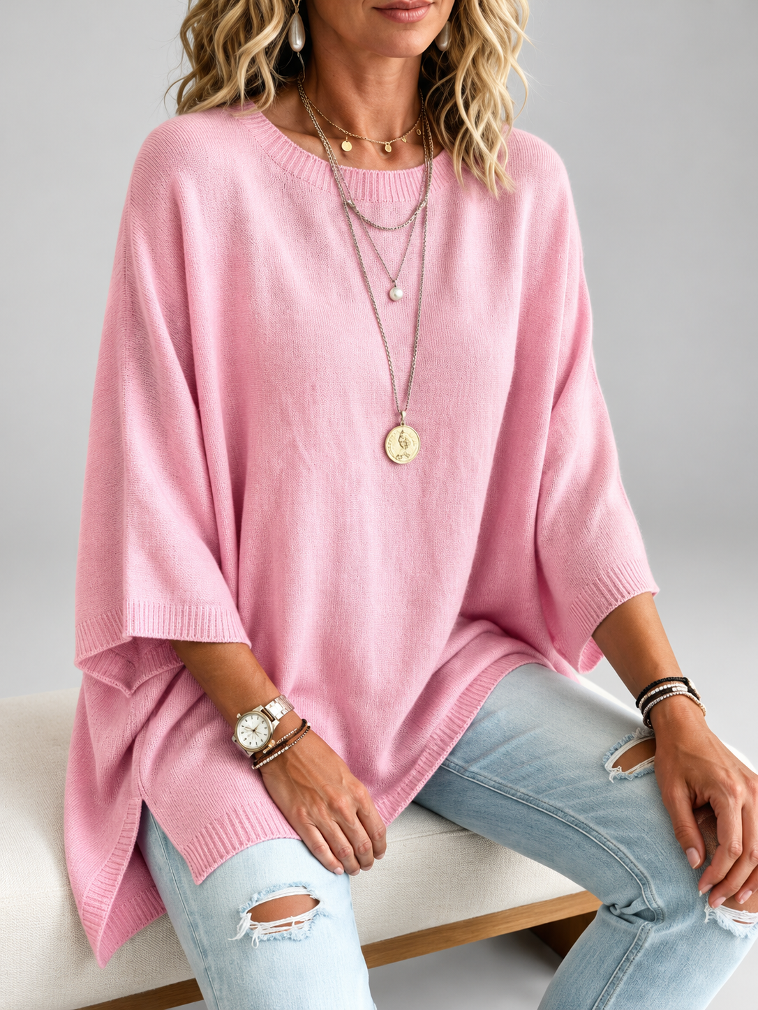 Women's oversized knitted jumper in Pink – studio view 2