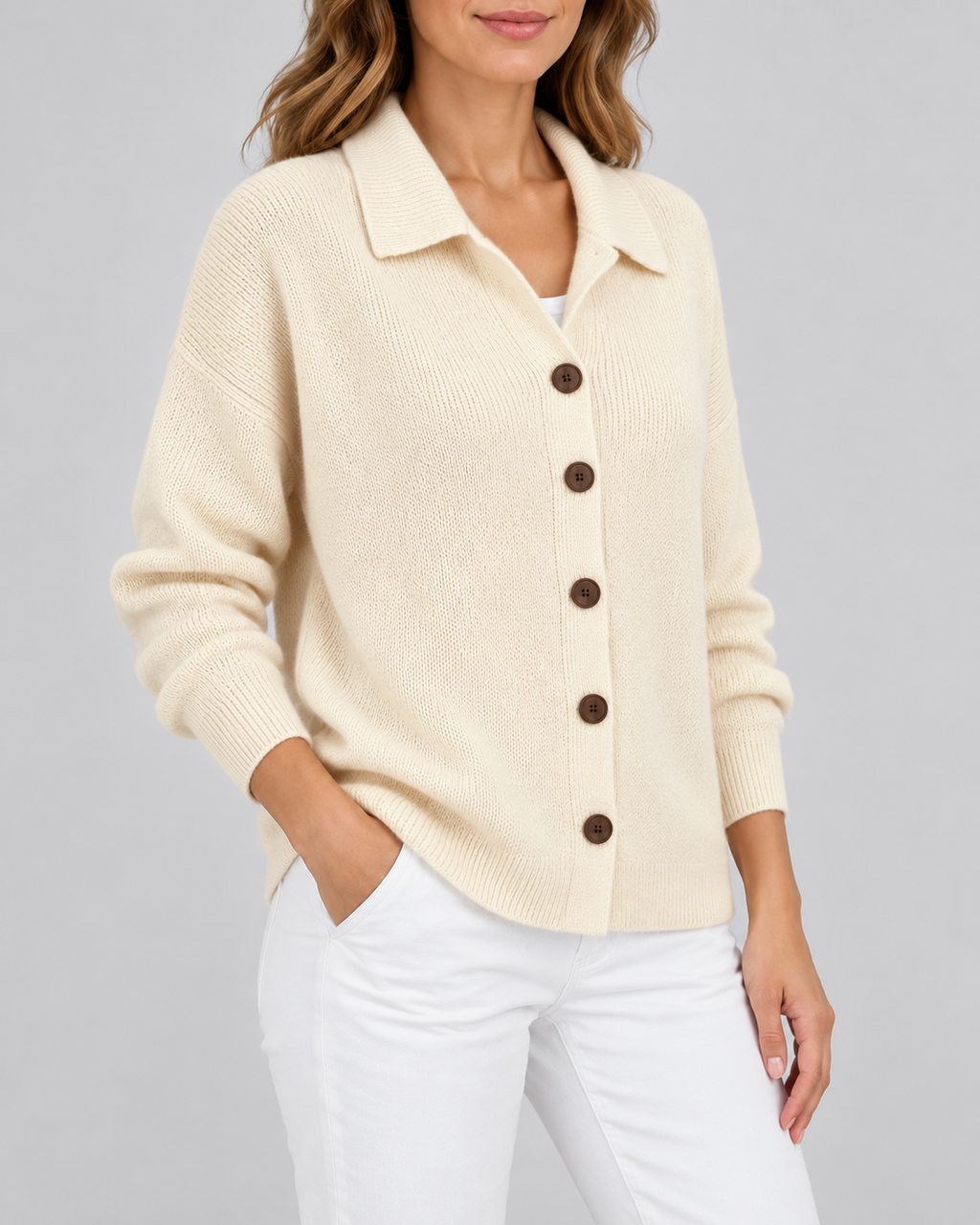 apricot knitted cardigan – studio three-quarter view