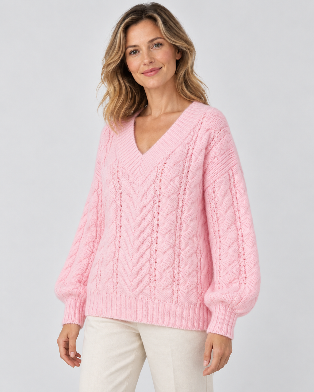 pink cable knit V-neck jumper – 02_three-quarter studio view