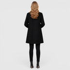 Women's wool blend longline coat with a button front and side pockets