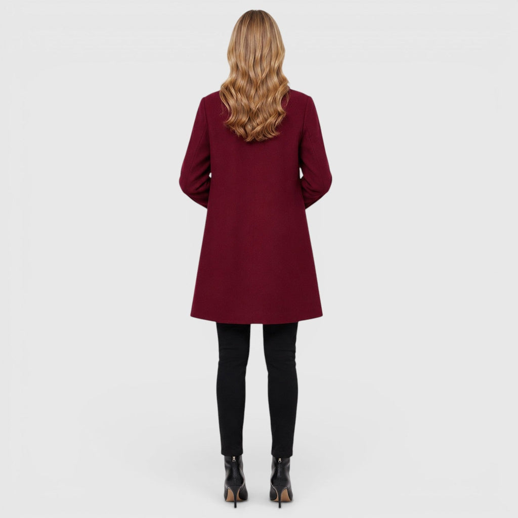 Women's wool blend longline coat with a button front and side pockets