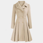 Women's double breasted wool blend coat with a fitted waist and a flared hem