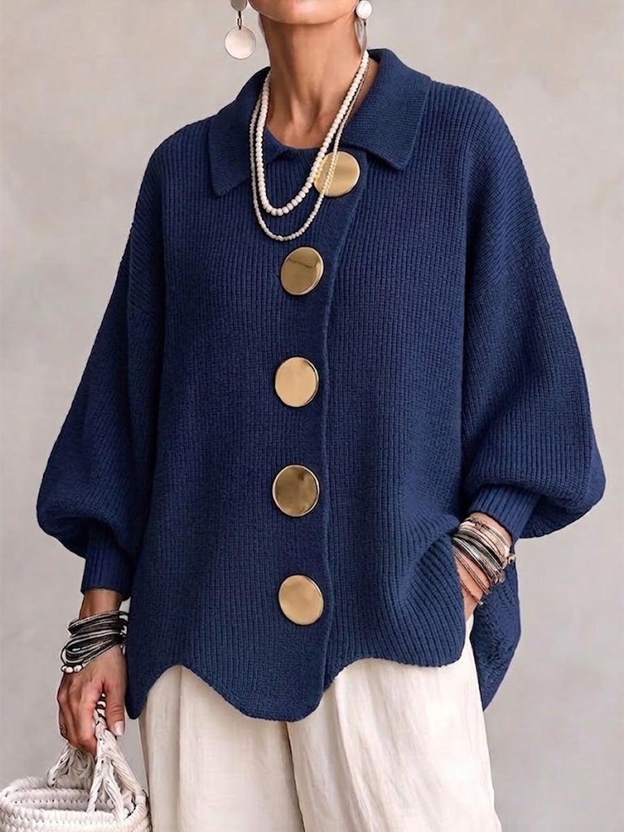 Women's oversized rib knit cardigan with large gold buttons and a scalloped hem