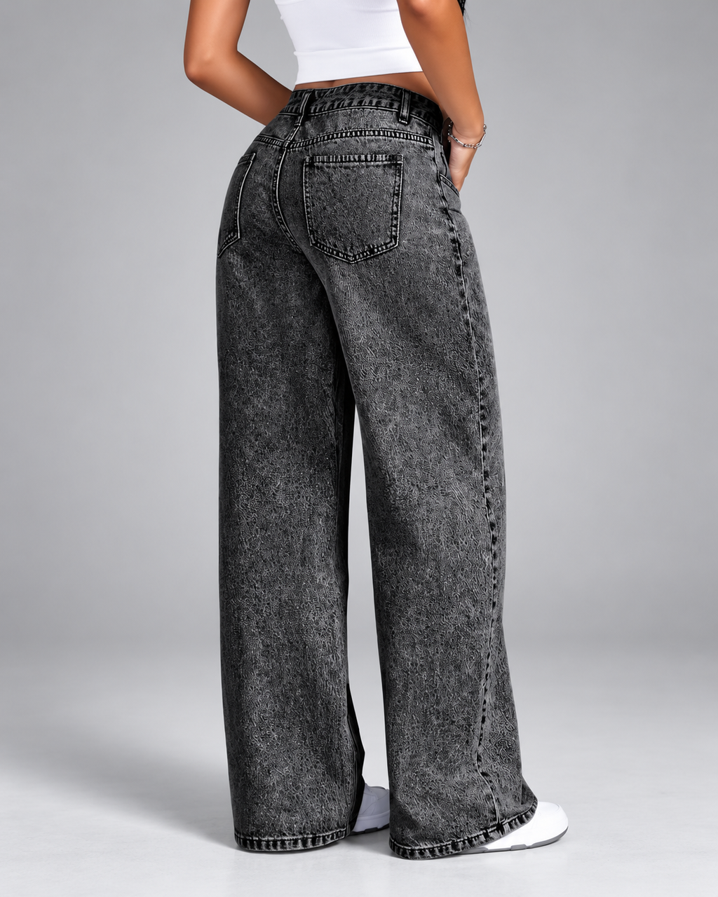 Women's black acid wash jeans with wide leg and mid rise