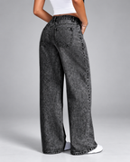 Women's black acid wash jeans with wide leg and mid rise