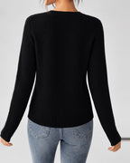 Women's Cable Knit Cardigan with Round Neck and Button Front in Black – back view