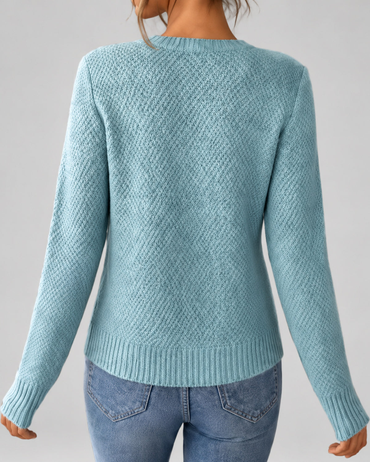 Women's Cable Knit Cardigan with Round Neck and Button Front in Light Blue – back view