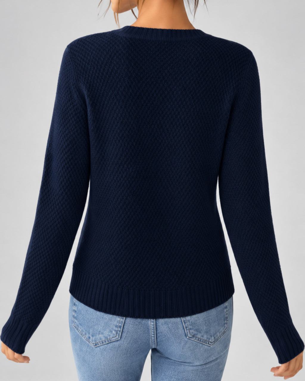 Women's Cable Knit Cardigan with Round Neck and Button Front in Navy – back view