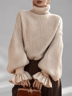Women's Chunky Ribbed Roll Neck Jumper with Balloon Sleeves and Frill Cuffs in Apricot – photo 1