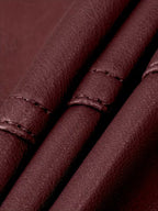 Burgundy cropped moto jacket sleeve detail