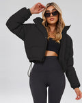 Women's Cropped Hooded Puffer Jacket with Zip Front and Drawcord Hem in Black – studio view