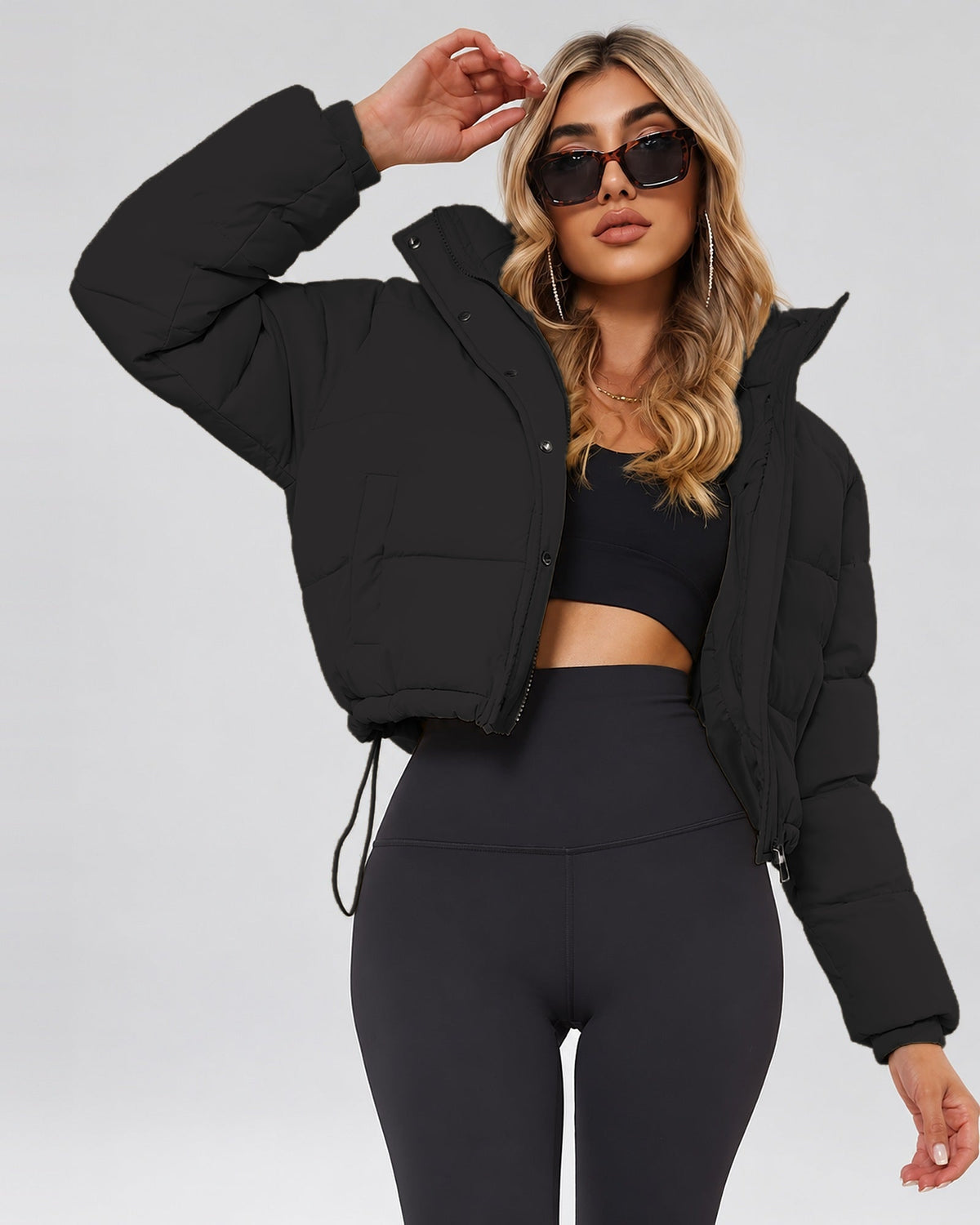 Women's Cropped Hooded Puffer Jacket with Zip Front and Drawcord Hem in Black – studio view