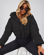 Women's Cropped Hooded Puffer Jacket with Zip Front and Drawcord Hem in Black – studio view