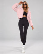 Women's Cropped Hooded Puffer Jacket with Zip Front and Drawcord Hem in Pink – studio view