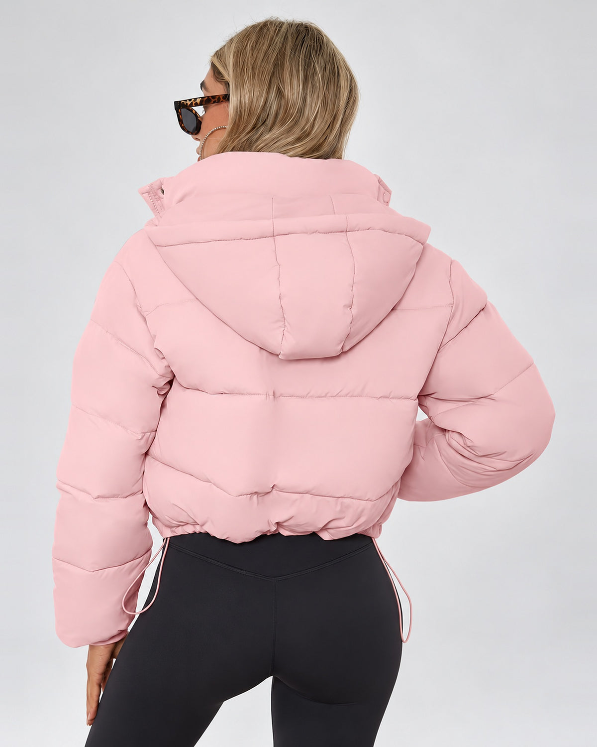 Women's Cropped Hooded Puffer Jacket with Zip Front and Drawcord Hem in Pink – studio view