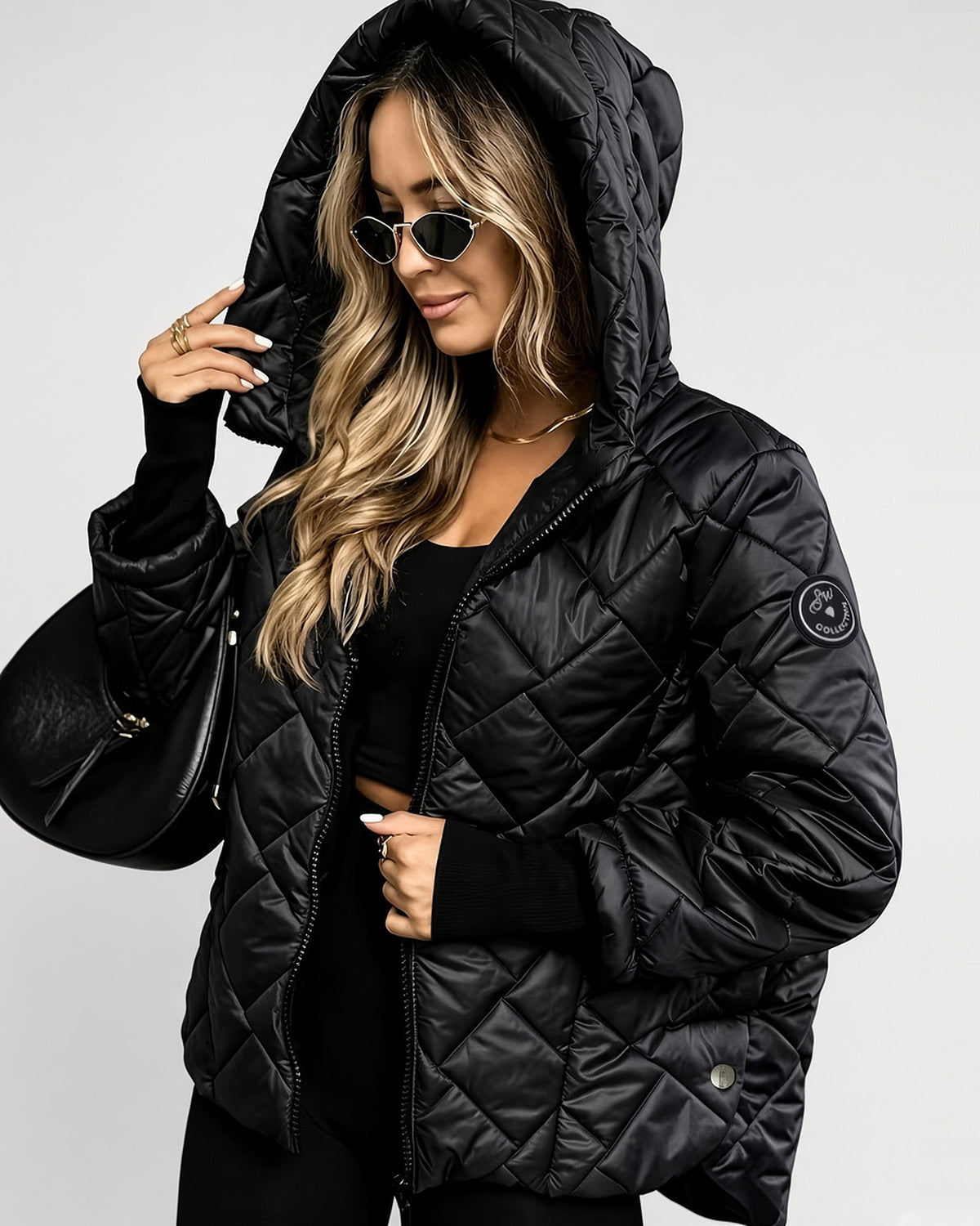 Women's Diamond Quilted Hooded Jacket with Zip Front and Ribbed Cuffs in Black – hooded front view