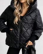 Women's Diamond Quilted Hooded Jacket with Zip Front and Ribbed Cuffs in Black – front detail view