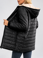 Women's Hooded Longline Quilted Padded Jacket in Black — studio image 2